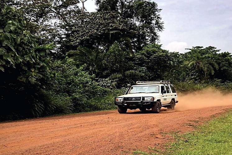 A 4x4 vehicle on a dirt road during off-road training